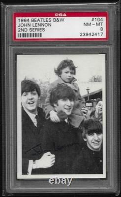 1964 TOPPS BEATLES 2nd SER. # 104 John LENNON HOLDING JULIAN PSA 8 NM-MINT