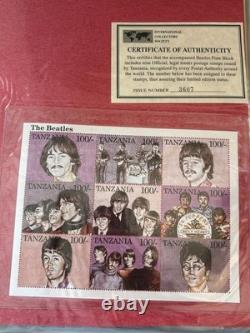 Beatles John Lennon Official ICS Stamp Binder Chad Tanzania Worldwide MNH COAs Beatles John Lennon Official ICS Stamp Binder Chad Tanzania Worldwide MNH COAs