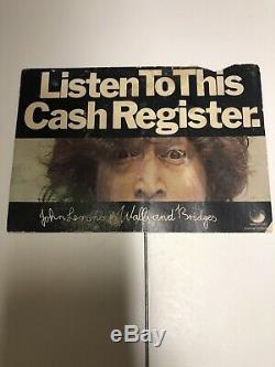 Beatles John Lennon listen to this cash register walls and Bridges store display