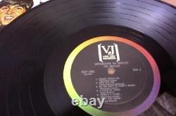 EX 1964 original Vee Jay Lp album The BEATLES Songs Pictures Stories & VJ inner