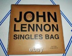 JOHN LENNON Beatles 2010 Singles Bag 3x 45 POSTER POSTCARDS NUMBERED SEALED NM