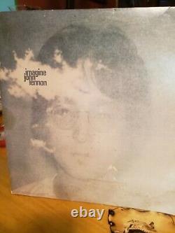 John Lennon vntg classic album. Published in 1971. Imagin. Withclouds of smoke