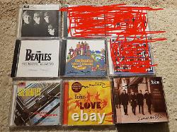 LOVE Beatles CD signed George Martin autograph (John Lennon)