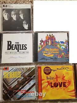 LOVE Beatles CD signed George Martin autograph (John Lennon)