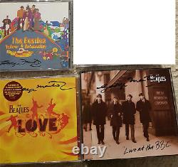 LOVE Beatles CD signed George Martin autograph (John Lennon)