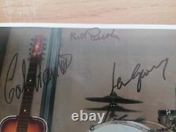 The beatles signed the quarrymen Paul mccartney John lennon Colin hanton photo